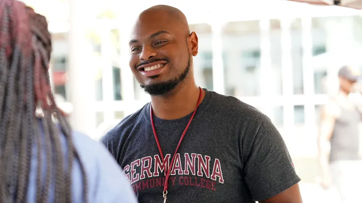 Germanna team member greeting a student